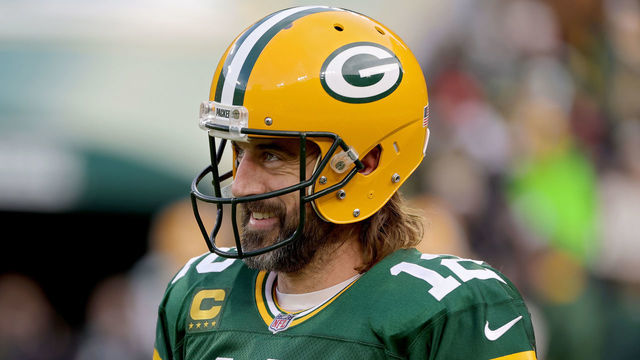 GREEN BAY, WISCONSIN - DECEMBER 25: Aaron Rodgers #12 of the Green Bay Packers looks on before the game against the Cleveland Browns at Lambeau Field on December 25, 2021 in Green Bay, Wisconsin.