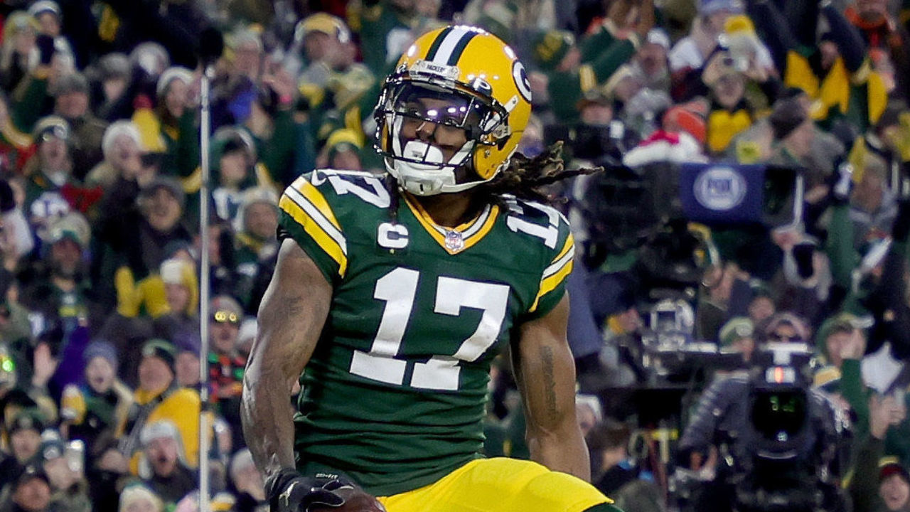 GREEN BAY, WISCONSIN - DECEMBER 25: Davante Adams #17 of the Green Bay Packers celebrates after scoring a touchdown in the second quarter against the Cleveland Browns at Lambeau Field on December 25, 2021 in Green Bay, Wisconsin.