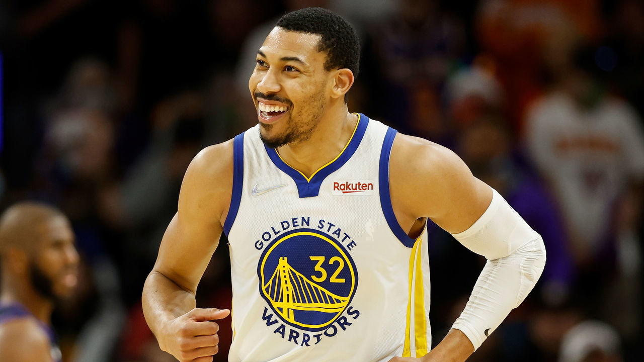 PHOENIX, ARIZONA - DECEMBER 25: Otto Porter Jr. #32 of the Golden State Warriors reacts after a three-point shot against the Phoenix Suns during the second half of NBA game at Footprint Center on December 25, 2021 in Phoenix, Arizona. The Warriors defeated the Suns 116-107.