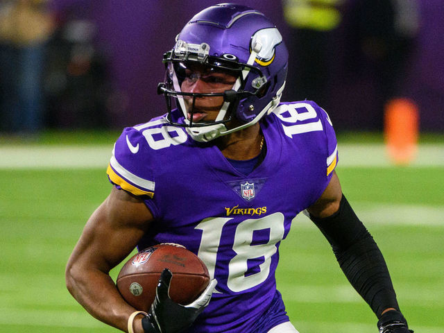 MINNEAPOLIS, MN - OCTOBER 31: Justin Jefferson #18 of the Minnesota Vikings runs with the ball in the first quarter the game against the Dallas Cowboys at U.S. Bank Stadium on October 31, 2021 in Minneapolis, Minnesota.