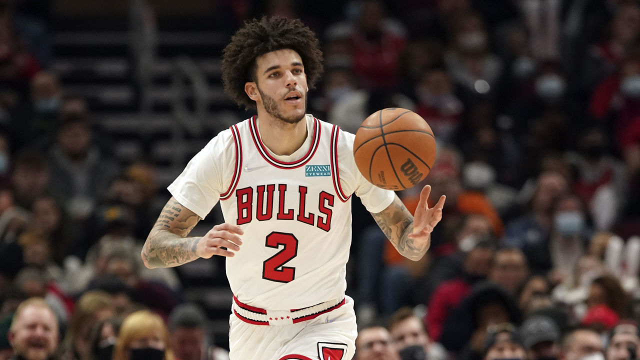 CHICAGO, ILLINOIS - DECEMBER 20: Lonzo Ball #2 of the Chicago Bulls brings the ball up the court against the Houston Rockets at the United Center on December 20, 2021 in Chicago, Illinois.