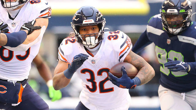 SEATTLE, WASHINGTON - DECEMBER 26: David Montgomery #32 of the Chicago Bears runs the ball during the third quarter against the Seattle Seahawks at Lumen Field on December 26, 2021 in Seattle, Washington.
