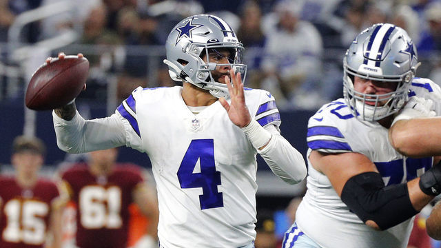 ARLINGTON, TEXAS - DECEMBER 26: Dak Prescott #4 of the Dallas Cowboys throws a pass during the first quarter against the Washington Football Team at AT&T Stadium on December 26, 2021 in Arlington, Texas.