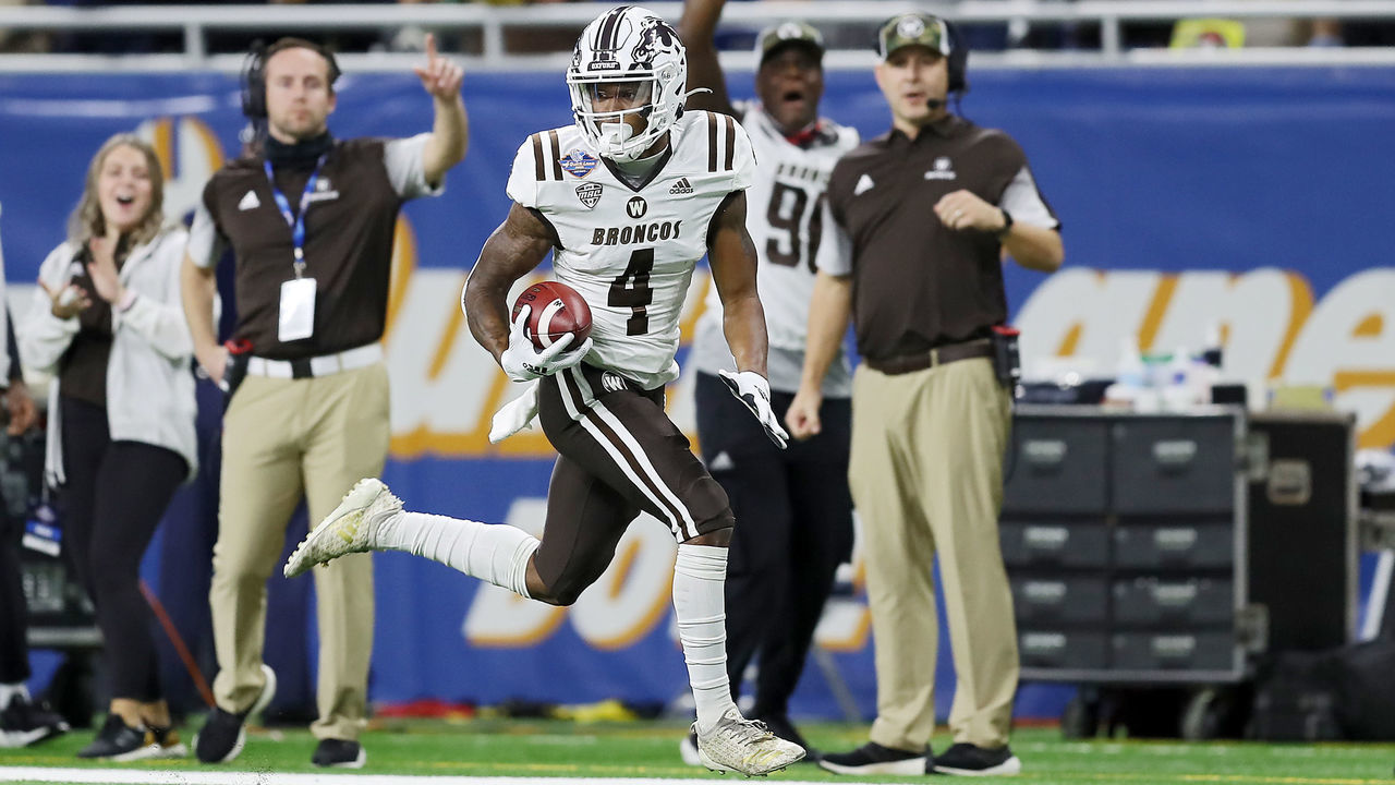 DETROIT, MICHIGAN - DECEMBER 27: Corey Crooms #4 of the Western Michigan Broncos runs up the field for a touchdown against the Nevada Wolf Pack in the first quarter during the Quick Lane Bowl at Ford Field on December 27, 2021 in Detroit, Michigan.