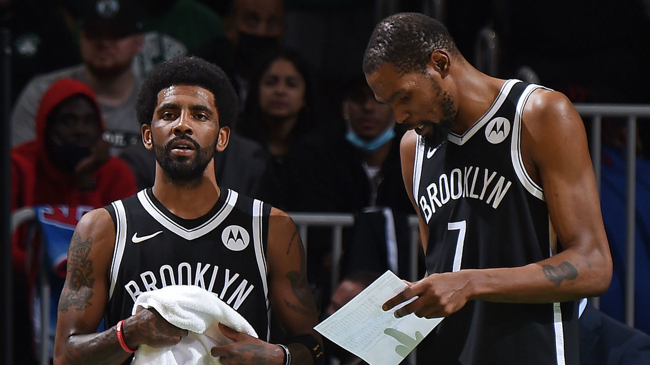 BOSTON, MA - MAY 30: Kyrie Irving #11 and Kevin Durant #7 of the Brooklyn Nets look on during the game against the Boston Celtics during Round 1, Game 4 of the 2021 NBA Playoffs on May 30, 2021 at the TD Garden in Boston, Massachusetts. Mandatory Copyright Notice: Copyright 2021 NBAE