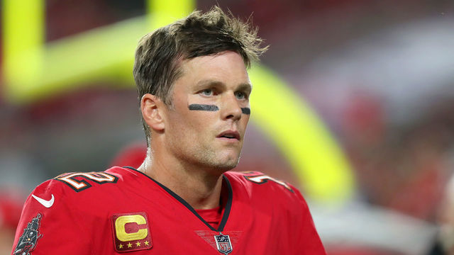 TAMPA, FL - DECEMBER 19: Tampa Bay Buccaneers Quarterback Tom Brady (12) walks off the field during the regular season game between the New Orleans Saints and the Tampa Bay Buccaneers on December 19, 2021 at Raymond James Stadium in Tampa, Florida.
