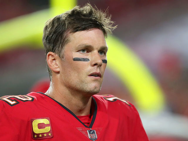 Tom Brady of the Tampa Bay Buccaneers on the sideline during the News  Photo - Getty Images