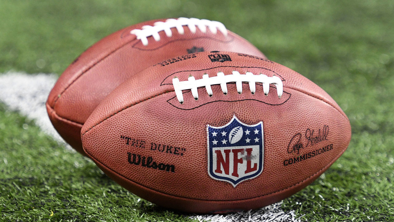 INDIANAPOLIS, IN - DECEMBER 18: An NFL logo is seen on the side of a football before the NFL football game between the New England Patriots and the Indianapolis Colts on December 18, 2021, at Lucas Oil Stadium in Indianapolis, Indiana.