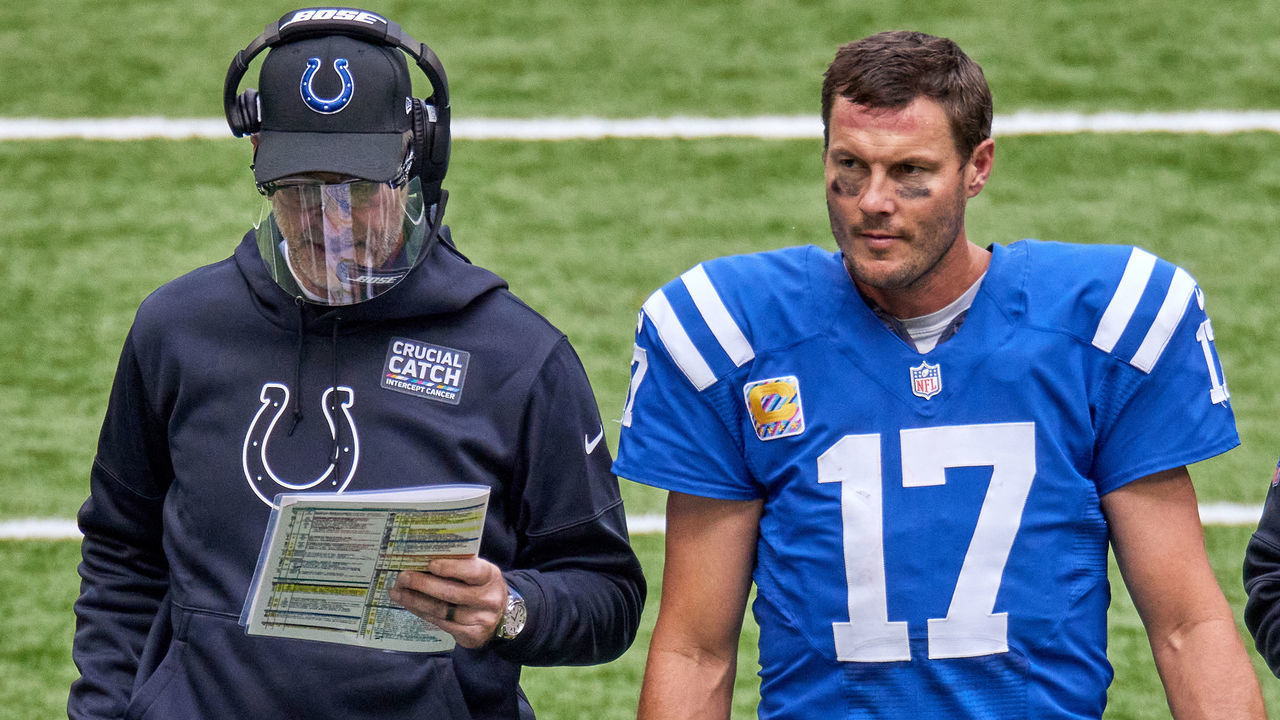 INDIANAPOLIS, IN - OCTOBER 18: Indianapolis Colts Quarterback Philip Rivers (17) chats with Indianapolis Colts head coach Frank Reich in game action during a NFL game between the Indianapolis Colts and the Cincinnati Bengals on October 18, 2020, at Lucas Oil Stadium in Indianapolis, IN.