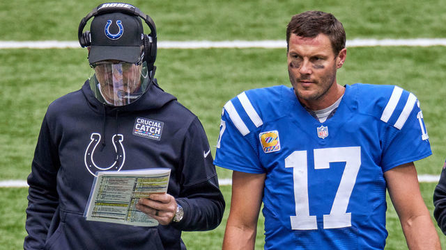 INDIANAPOLIS, IN - OCTOBER 18: Indianapolis Colts Quarterback Philip Rivers (17) chats with Indianapolis Colts head coach Frank Reich in game action during a NFL game between the Indianapolis Colts and the Cincinnati Bengals on October 18, 2020, at Lucas Oil Stadium in Indianapolis, IN.