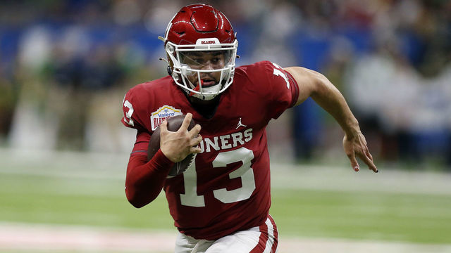 SAN ANTONIO, TX - DECEMBER 29: Oklahoma Sooners quarterback Caleb Williams (13) runs the ball against the Oregon Ducks during the Valero Alamo Bowl football game at the Alamodome on December 29, 2021 in San Antonio, TX.