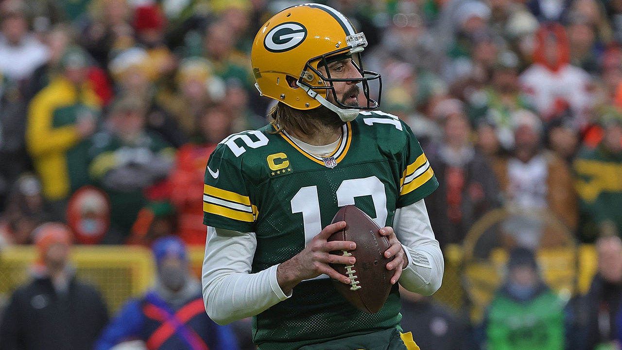 GREEN BAY, WISCONSIN - DECEMBER 25: Aaron Rodgers #12 of the Green Bay Packers drops back to pass during a game against the Cleveland Browns at Lambeau Field on December 25, 2021 in Green Bay, Wisconsin. The Packers defeated the Browns 24-22.