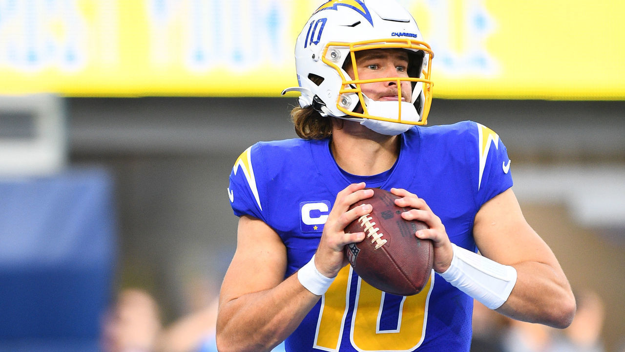 INGLEWOOD, CA - DECEMBER 12: Los Angeles Chargers Quarterback Justin Herbert (10) drops back to pass during the NFL game between the New York Giants and the Los Angeles Chargers on December 12, 2021, at SoFi Stadium in Inglewood, CA.
