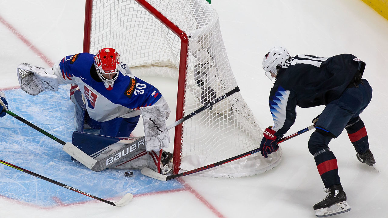 EDMONTON, AB - JANUARY 02: Matthew Beniers #10 of the United States takes a shot against goaltender Simon Latkoczy #30 of Slovakia during the 2021 IIHF World Junior Championship quarterfinals at Rogers Place on January 2, 2021 in Edmonton, Canada.