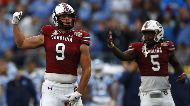 CHARLOTTE, NORTH CAROLINA - DECEMBER 30: Nick Muse #9 and Dakereon Joyner #5 of the South Carolina Gamecocks react following a play during the first half of the Duke's Mayo Bowl against the North Carolina Tar Heels at Bank of America Stadium on December 30, 2021 in Charlotte, North Carolina.