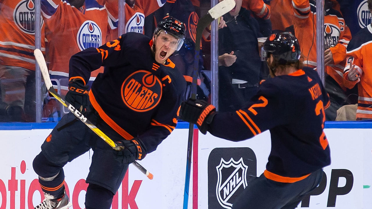 EDMONTON, AB - NOVEMBER 18: Connor McDavid #97 and Duncan Keith #2 of the Edmonton Oilers celebrate a goal against the Winnipeg Jets during the third period at Rogers Place on November 18, 2021 in Edmonton, Canada.
