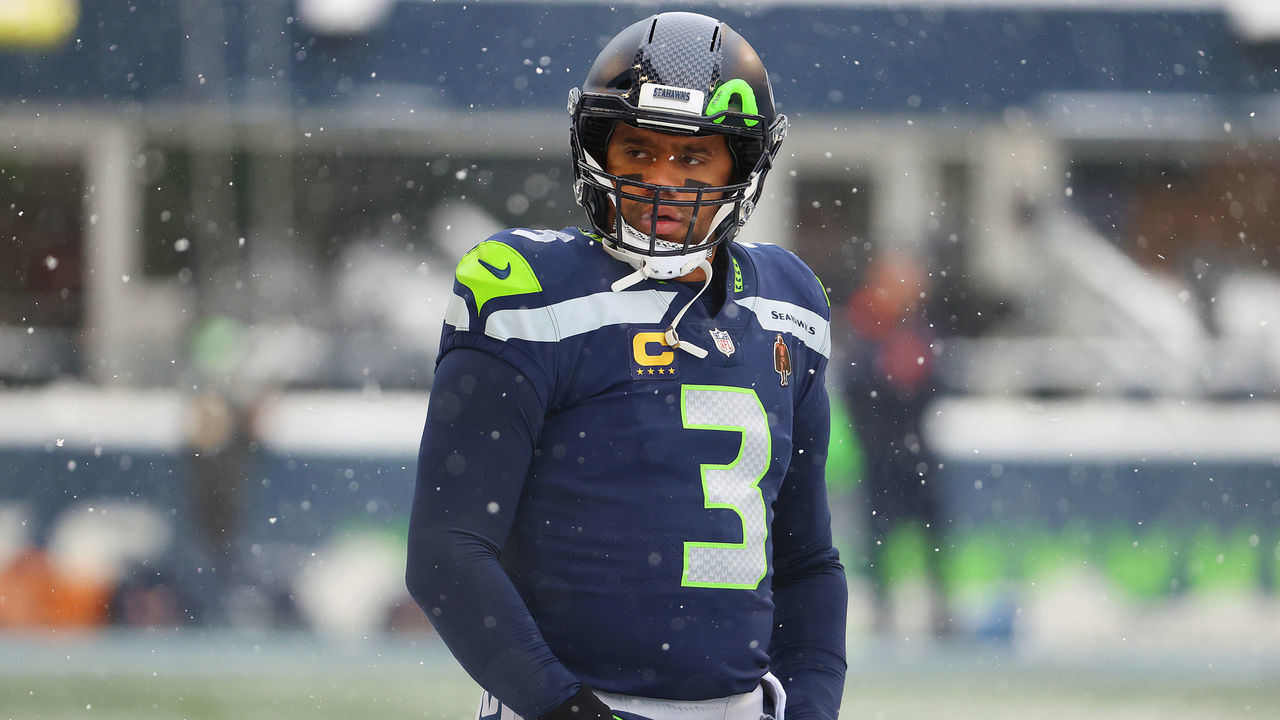 SEATTLE, WASHINGTON - DECEMBER 26: Russell Wilson #3 of the Seattle Seahawks looks on during warm-ups before the game against the Chicago Bears at Lumen Field on December 26, 2021 in Seattle, Washington.