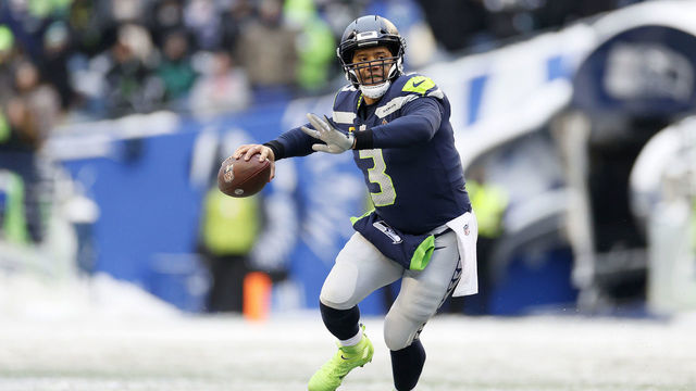 SEATTLE, WASHINGTON - DECEMBER 26: Russell Wilson #3 of the Seattle Seahawks looks to pass against the Chicago Bears during the third quarter at Lumen Field on December 26, 2021 in Seattle, Washington.