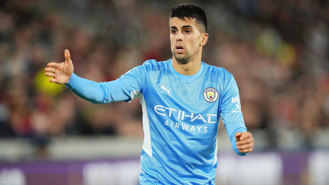BRENTFORD, ENGLAND - DECEMBER 29: Joao Cancelo of Manchester City looks on during the Premier League match between Brentford and Manchester City at Brentford Community Stadium on December 29, 2021 in Brentford, England.