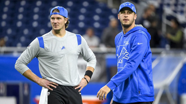 DETROIT, MICHIGAN - NOVEMBER 25: Tim Boyle #12 of the Detroit Lions and Jared Goff #16 of the Detroit Lions warm up before the game against the Chicago Bears at Ford Field on November 25, 2021 in Detroit, Michigan.
