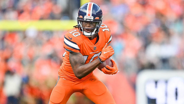 DENVER, CO - NOVEMBER 14: Denver Broncos wide receiver Jerry Jeudy (10) runs after a catch during a game between the Denver Broncos and the Philadelphia Eagles at Empower Field at Mile High on November 14, 2021 in Denver, Colorado.