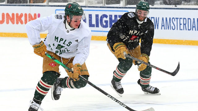 MINNEAPOLIS, MINNESOTA - DECEMBER 31: Kirill Kaprizov #97 and Alex Goligoski #47 of the Minnesota Wild skate during a practice session before the 2022 NHL Winter Classic between the St. Louis Blues and the Minnesota Wild at Target Field on December 31, 2021 in Minneapolis, Minnesota.