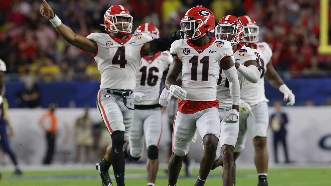 MIAMI GARDENS, FL - DECEMBER 31: Georgia Bulldogs defensive back Derion Kendrick (11) celebrates an interception during the Capital One Orange Bowl game between the Georgia Bulldogs and the Michigan Wolverines on December 31, 2021 at Hard Rock Stadium in Miami Gardens, Fl.