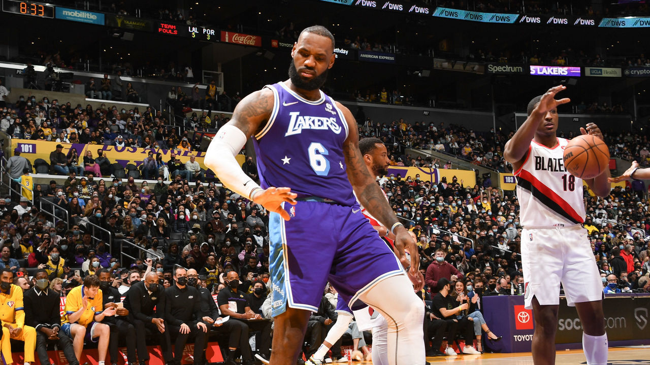LOS ANGELES, CA - DECEMBER 31: LeBron James #6 of the Los Angeles Lakers reacts to a play during the game against the Portland Trail Blazers on December 31, 2021 at Crypto.Com Arena in Los Angeles, California. NOTE TO USER: User expressly acknowledges and agrees that, by downloading and/or using this Photograph, user is consenting to the terms and conditions of the Getty Images License Agreement. Mandatory Copyright Notice: Copyright 2021 NBAE
