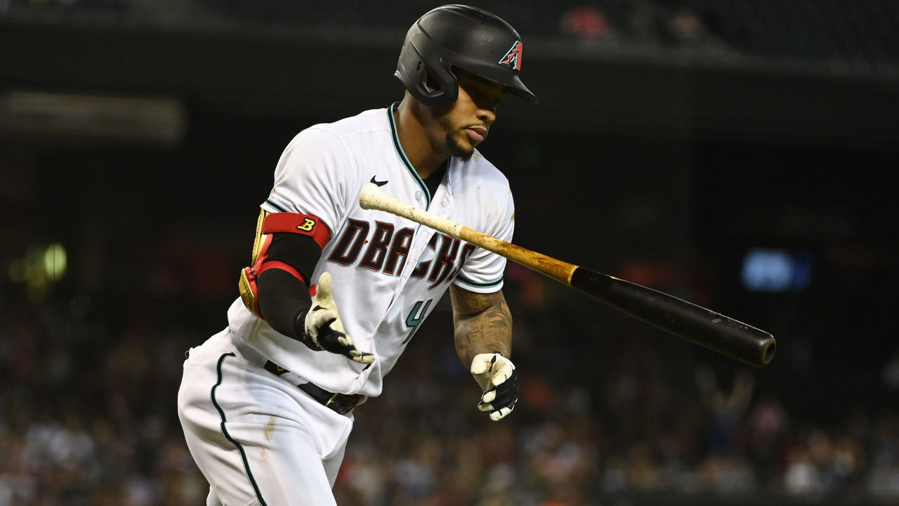 PHOENIX, ARIZONA - OCTOBER 01: Ketel Marte #4 of the Arizona Diamondbacks tosses his bat after hitting a home run against the Colorado Rockies at Chase Field on October 01, 2021 in Phoenix, Arizona.