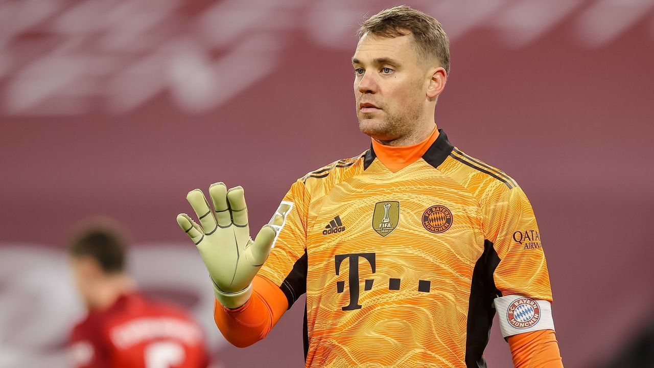 MUNICH, GERMANY - DECEMBER 17: goalkeeper Manuel Neuer of Bayern Muenchen gestures during the Bundesliga match between FC Bayern München and VfL Wolfsburg at Allianz Arena on December 17, 2021 in Munich, Germany.