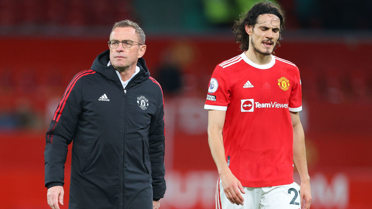 MANCHESTER, ENGLAND - DECEMBER 30: Ralf Rangnick, manager of Manchester United, with Edinson Cavani of Manchester United after the Premier League match between Manchester United and Burnley at Old Trafford on December 30, 2021 in Manchester, England.