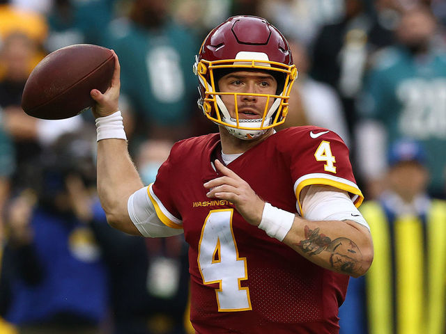 LANDOVER, MARYLAND - JANUARY 02: Taylor Heinicke #4 of the Washington Football Team throws the ball during the second half against the Philadelphia Eagles at FedExField on January 02, 2022 in Landover, Maryland.