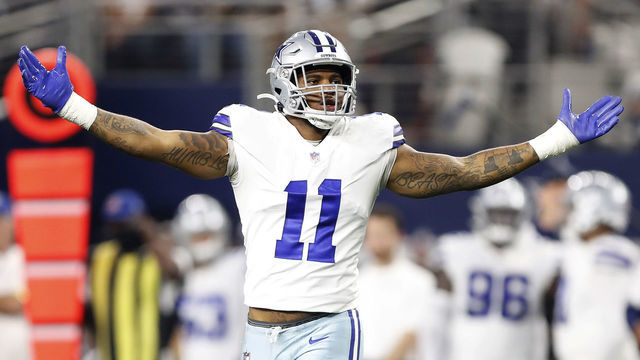ARLINGTON, TEXAS - DECEMBER 26: Micah Parsons #11 of the Dallas Cowboys celebrates after a sack during the second half against the Washington Football Team at AT&T Stadium on December 26, 2021 in Arlington, Texas.