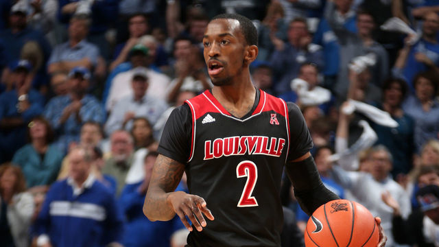 MEMPHIS, TN - MARCH 1: Russ Smith #2 of the Louisville Cardinals dribbles the ball upcourt against the Memphis Tigers on March 1, 2014 at FedExForum in Memphis, Tennessee. Memphis beat Louisville 72-66.