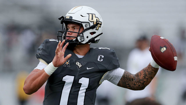 ORLANDO, FL - SEPTEMBER 11: Dillon Gabriel #11 of the UCF Knights attempts a pass during warmups against Bethune Cookman Wildcats at the Bounce House on September 11, 2021 in Orlando, Florida.