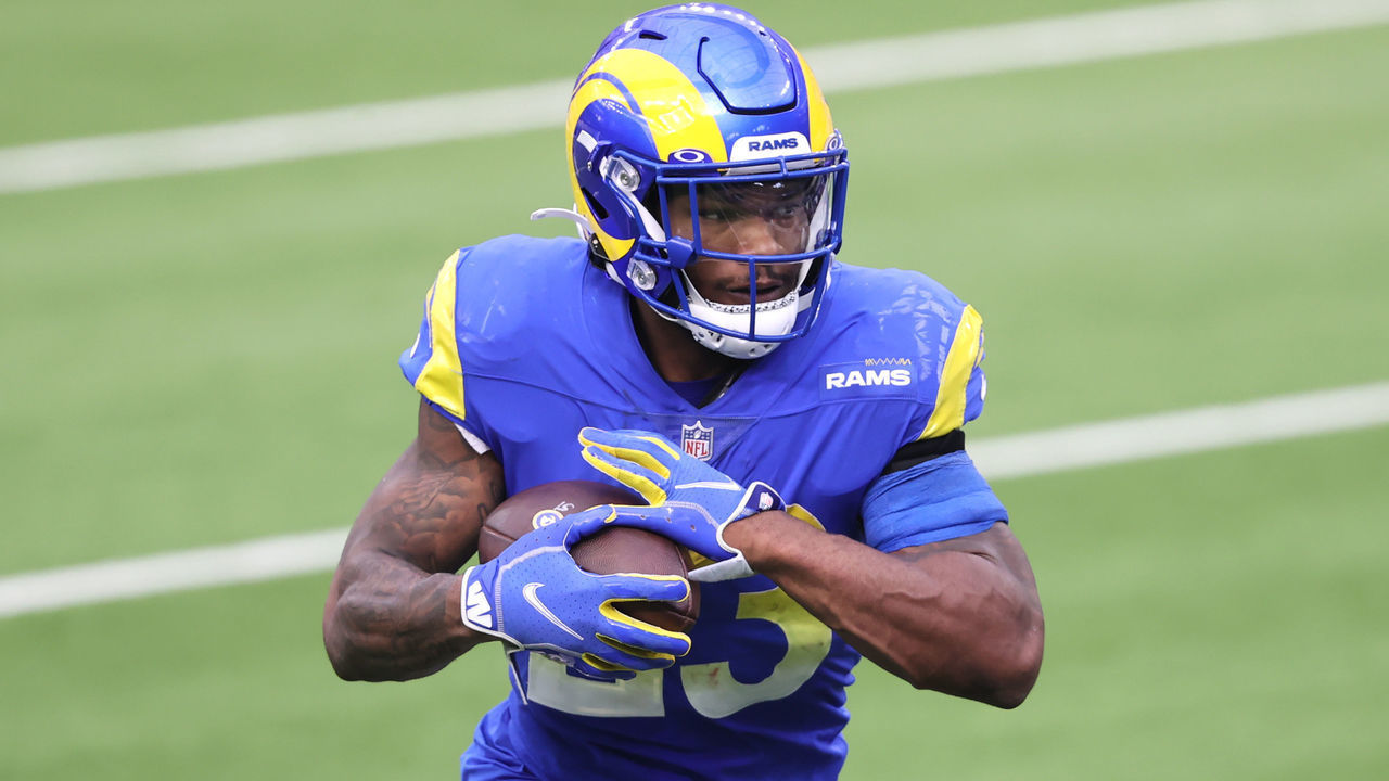 INGLEWOOD, CALIFORNIA - JANUARY 03: Cam Akers #23 of the Los Angeles Rams rushes with the ball during the first half of a game against the Arizona Cardinals at SoFi Stadium on January 03, 2021 in Inglewood, California.