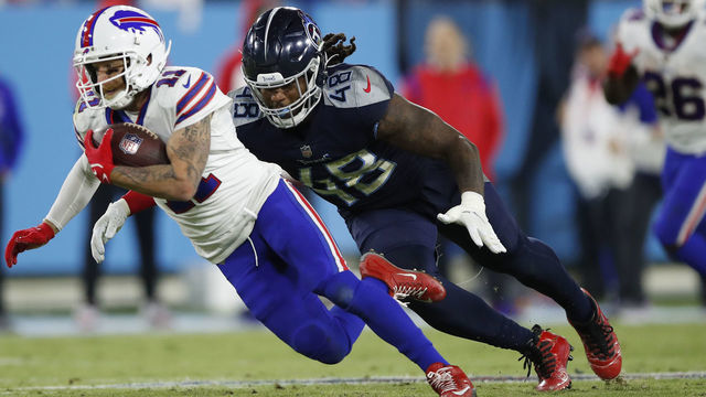 NASHVILLE, TENNESSEE - OCTOBER 18: Wide receiver Cole Beasley #11 of the Buffalo Bills is tackled by outside linebacker Bud Dupree #48 of the Tennessee Titans during the second half at Nissan Stadium on October 18, 2021 in Nashville, Tennessee.