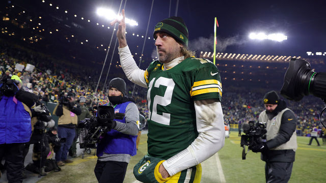 GREEN BAY, WISCONSIN - JANUARY 02: Quarterback Aaron Rodgers #12 of the Green Bay Packers walks off the field after the Packers defeated the Minnesota Vikings 37-10 to win the game at Lambeau Field on January 02, 2022 in Green Bay, Wisconsin.