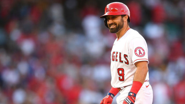 ANAHEIM, CA - JULY 16: Adam Eaton #9 of the Los Angeles Angels smiles after hitting a double in the game against the Seattle Mariners at Angel Stadium of Anaheim on July 16, 2021 in Anaheim, California.