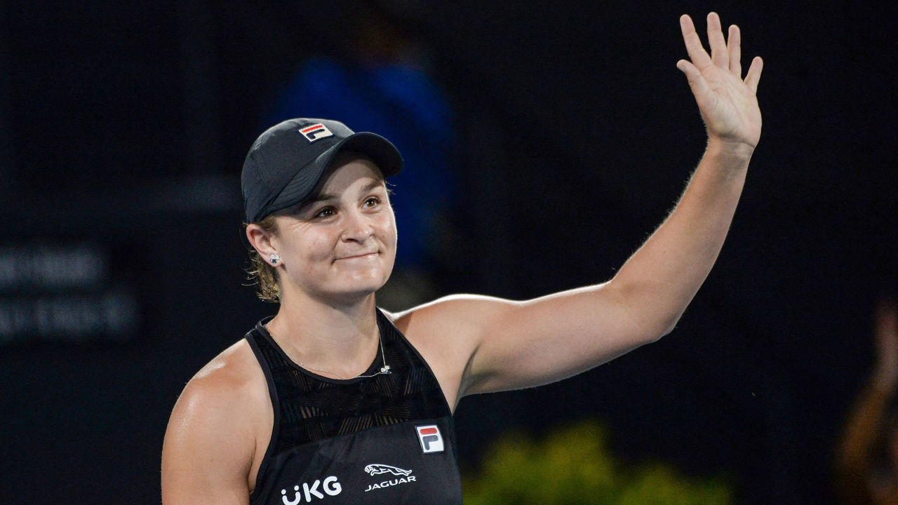 Ashleigh Barty of Australia acknowledges the crowd after winning against USA's Coco Gauff in their women's singles match at the Adelaide International tennis tournament in Adelaide on January 5, 2022. - - -- IMAGE RESTRICTED TO EDITORIAL USE - STRICTLY NO COMMERCIAL USE --