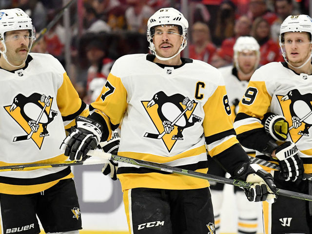 WASHINGTON, DC - NOVEMBER 14: The line of Penguins right wing Bryan Rust (17), center Sidney Crosby (87), and left wing Jake Guentzel (59) all wait for a face-off during the Pittsburgh Penguins versus Washington Capitals National Hockey League game on November 14, 2021 at Capital One Arena in Washington, D.C..