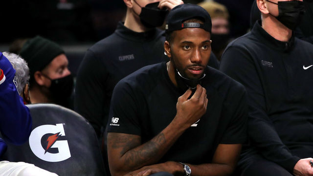 LOS ANGELES, CALIFORNIA - DECEMBER 26: Kawhi Leonard #2 of the Los Angeles Clippers looks on from the bench during the third quarter against the Denver Nuggets at Crypto.com Arena on December 26, 2021 in Los Angeles, California. NOTE TO USER: User expressly acknowledges and agrees that, by downloading and/or using this Photograph, user is consenting to the terms and conditions of the Getty Images License Agreement.