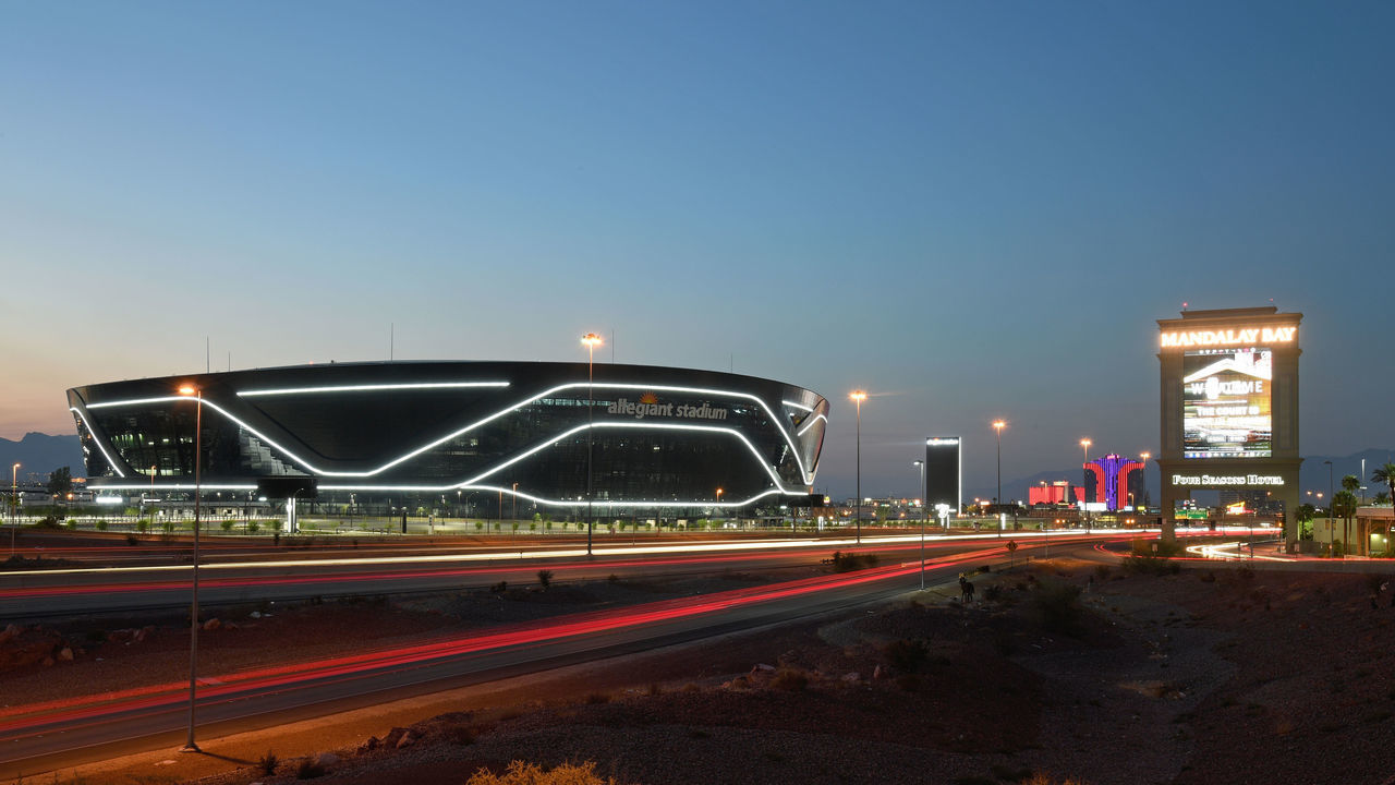LAS VEGAS, NEVADA - SEPTEMBER 19: An exterior view shows Allegiant Stadium, the USD 2 billion, 65,000-seat home of the Las Vegas Raiders, west of a marquee at Mandalay Bay Resort and Casino on September 19, 2020 in Las Vegas, Nevada. The Raiders will play their first game as Las Vegas' NFL franchise at the glass-domed facility against the New Orleans Saints on September 21, coinciding with the 50th anniversary of the league's first "Monday Night Football" broadcast.