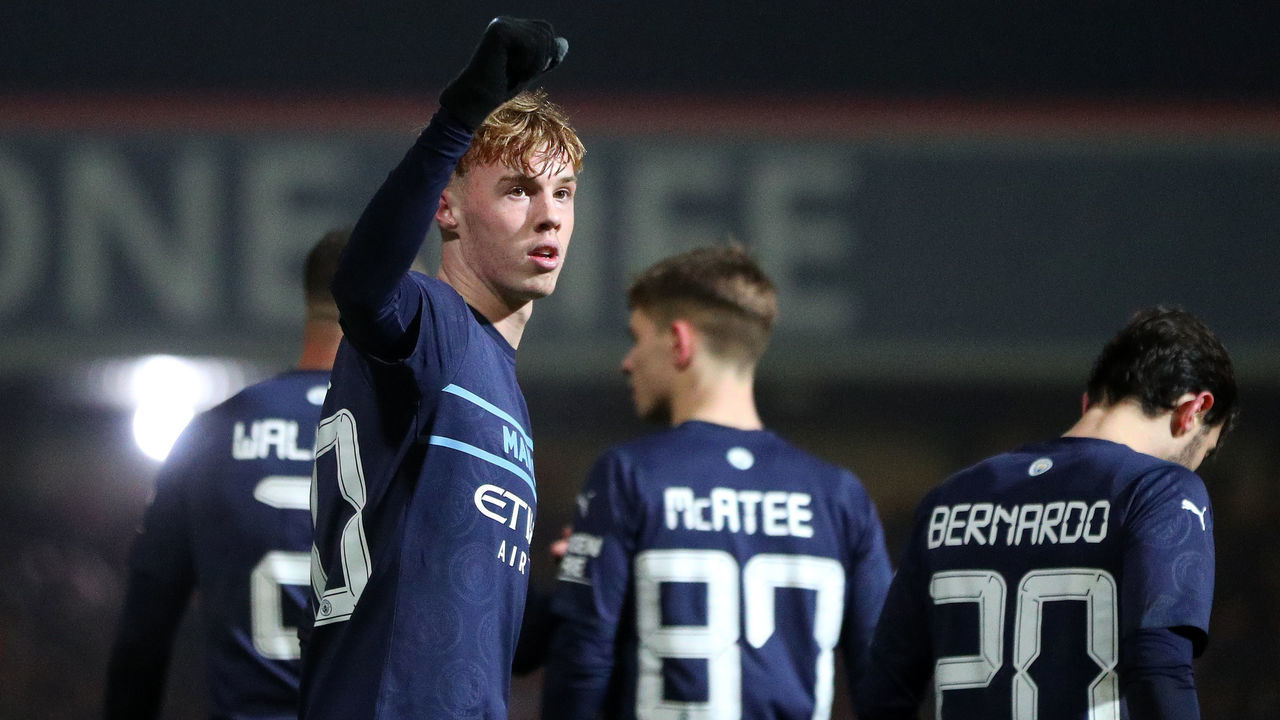 SWINDON, ENGLAND - JANUARY 07: Cole Palmer of Manchester City celebrates after scoring their team's fourth goal during the Emirates FA Cup Third Round match between Swindon Town and Manchester City at The County Ground on January 07, 2022 in Swindon, England.