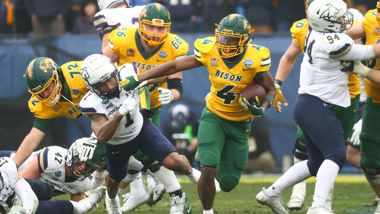 FRISCO, TX - JANUARY 08: Kobe Johnson #4 of the North Dakota State Bison runs the ball against the Montana State Bobcats during the Division I FCS Football Championship held at Toyota Stadium on January 8, 2022 in Frisco, Texas.