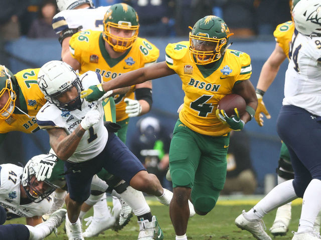 FRISCO, TX - JANUARY 08: Kobe Johnson #4 of the North Dakota State Bison runs the ball against the Montana State Bobcats during the Division I FCS Football Championship held at Toyota Stadium on January 8, 2022 in Frisco, Texas.
