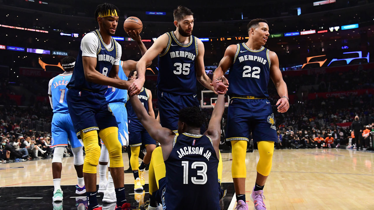 LOS ANGELES, CA - JANUARY 8: Ziaire Williams #8, Killian Tillie #35 and Desmond Bane #22 help up Jaren Jackson Jr. #13 of the Memphis Grizzlies during the game against the LA Clippers on January 8, 2022 at Crypto.Com Arena in Los Angeles, California. NOTE TO USER: User expressly acknowledges and agrees that, by downloading and/or using this Photograph, user is consenting to the terms and conditions of the Getty Images License Agreement. Mandatory Copyright Notice: Copyright 2022 NBAE