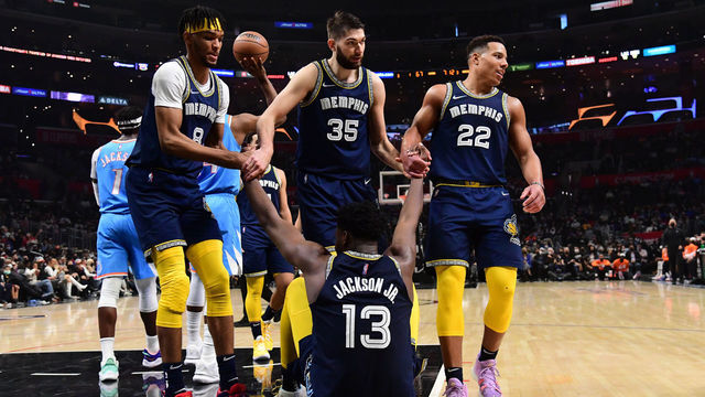 LOS ANGELES, CA - JANUARY 8: Ziaire Williams #8, Killian Tillie #35 and Desmond Bane #22 help up Jaren Jackson Jr. #13 of the Memphis Grizzlies during the game against the LA Clippers on January 8, 2022 at Crypto.Com Arena in Los Angeles, California. NOTE TO USER: User expressly acknowledges and agrees that, by downloading and/or using this Photograph, user is consenting to the terms and conditions of the Getty Images License Agreement. Mandatory Copyright Notice: Copyright 2022 NBAE