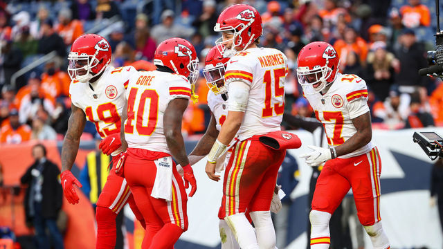 DENVER, COLORADO - JANUARY 08: Patrick Mahomes #15 of the Kansas City Chiefs celebrates with teammates following a touchdown during the second half against the Denver Broncos at Empower Field At Mile High on January 08, 2022 in Denver, Colorado.
