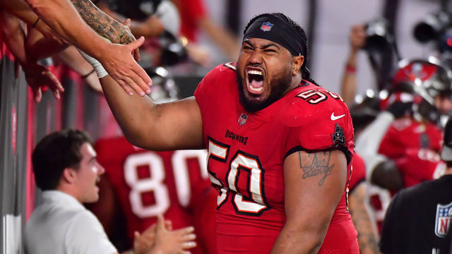TAMPA, FLORIDA - DECEMBER 12: Vita Vea #50 of the Tampa Bay Buccaneers celebrates after defeating the Buffalo Bills 33-27 in overtime at Raymond James Stadium on December 12, 2021 in Tampa, Florida.